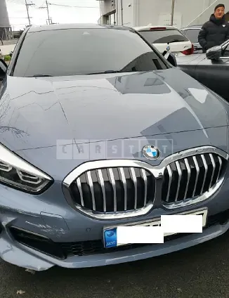 Photo 2 of 28: 2021 BMW 118d, VIN WBA7M9104M7H83522 — Korean insurance auction