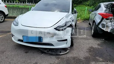 Photo 1 of 16: 2021 Tesla Model Y LongRange, VIN 5YJYGDEE1MF173544 — Korean insurance auction