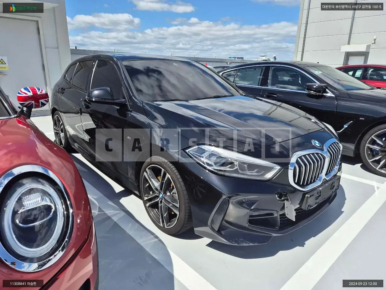 Photo 2 of 13: 2022 BMW 120i, VIN WBA7L7100N7L39897 — Korean insurance auction