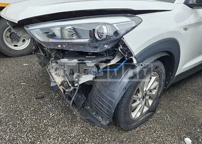 Photo 1 of 4: 2018 Hyundai Tucson, VIN KMHJ2812GJU548201 — Korean insurance auction