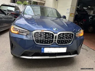 Photo 1 of 21: 2022 BMW X4 xDrive20i, VIN WBA21DT00N9L67196 — Korean insurance auction