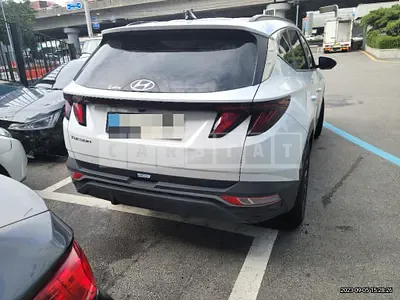 Photo 1 of 12: 2021 Hyundai Tucson 1.6, VIN KMHJC81BGMU074853 — Korean insurance auction
