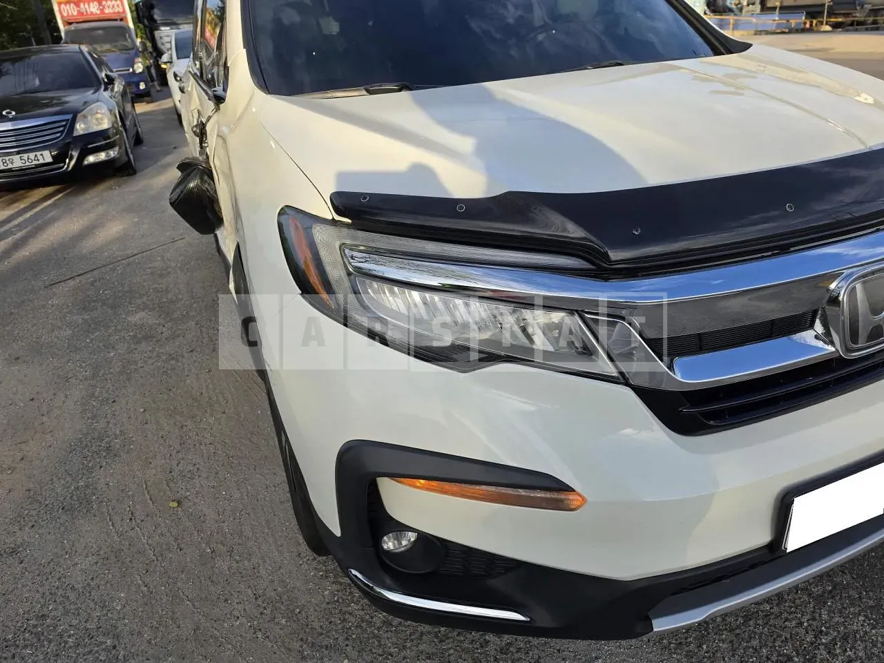 Photo 2 of 33: 2019 Honda Pilot, VIN 5FNYF6800KB200989 — Korean insurance auction