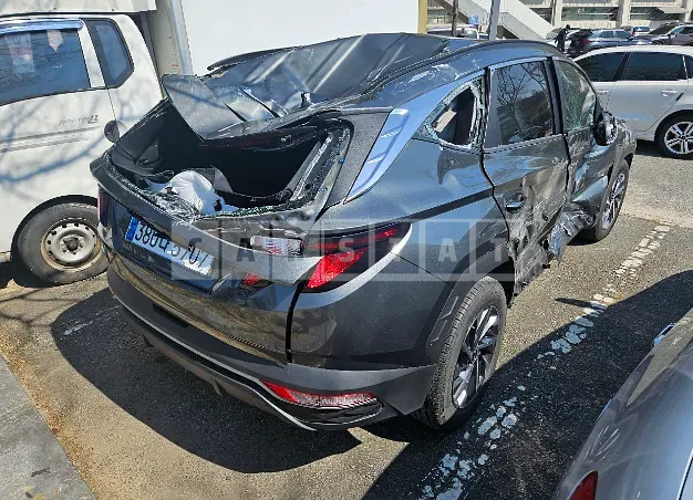 Photo 2 of 16: 2021 Hyundai Tucson, VIN KMHJC811BMU012660 — Korean insurance auction