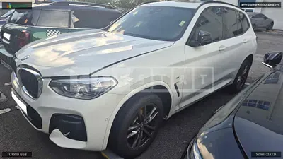 Photo 1 of 14: 2021 BMW X3 xDrive 20i, VIN WBA51BG04M9H89386 — Korean insurance auction