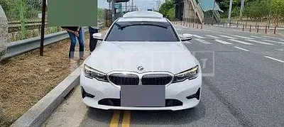 Photo 1 of 29: 2022 BMW 320i, VIN WBA5X5109NFM59655 — Korean insurance auction