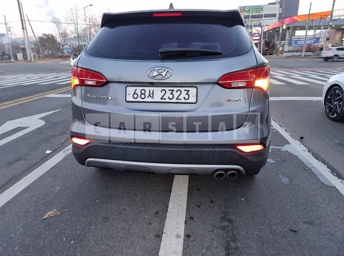 Photo 2 of 3: 2015 Hyundai Santa Fe, VIN KMHSW81UBFU497884 — Korean insurance auction