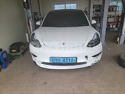 Photo 1 of 26: 2020 Tesla Model 3 Long Range, VIN 5YJ3E1EA0LF584654 — Korean insurance auction