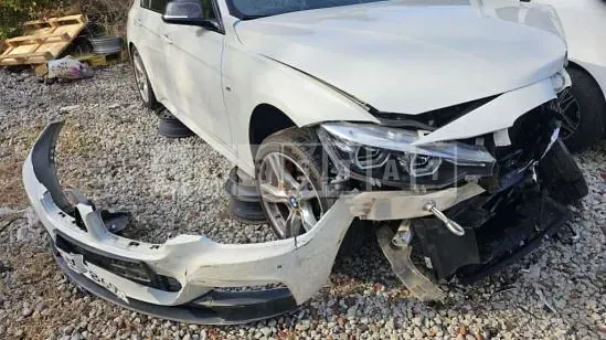 Photo 2 of 12: 2018 BMW 330i, VIN WBA8B9100JA538318 — Korean insurance auction