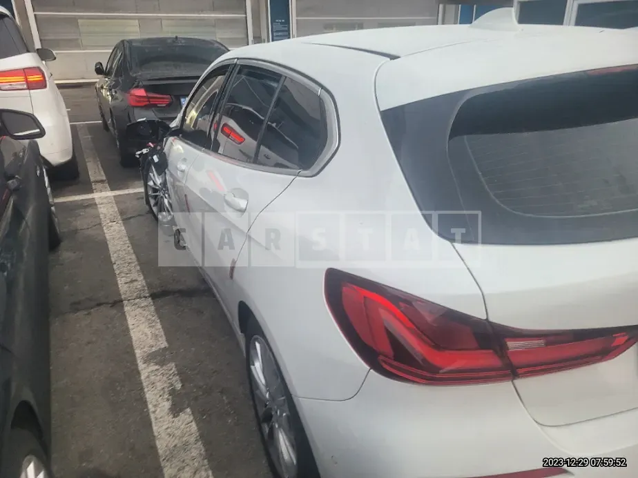 Photo 2 of 17: 2021 BMW 118d, VIN WBA7M9103M7H50396 — Korean insurance auction