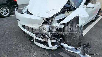 Photo 1 of 12: 2020 Tesla Model 3 Standard Range Plus R, VIN 5YJ3E1EAXLF724273 — Korean insurance auction