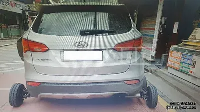 Photo 1 of 8: 2015 Hyundai Santa Fe, VIN KMHSU81UBFU447039 — Korean insurance auction