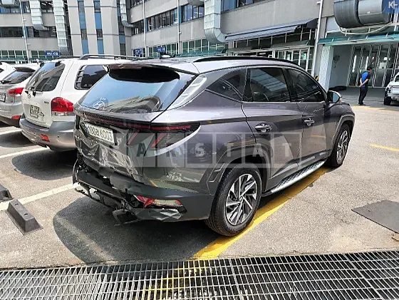 Photo 2 of 17: 2021 Hyundai Tucson, VIN KMHJE811BMU009774 — Korean insurance auction
