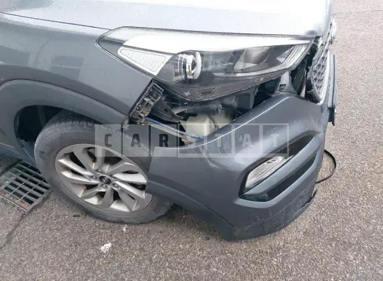 Photo 2 of 9: 2017 Hyundai Tucson, VIN KMHJ3815GHU226469 — Korean insurance auction