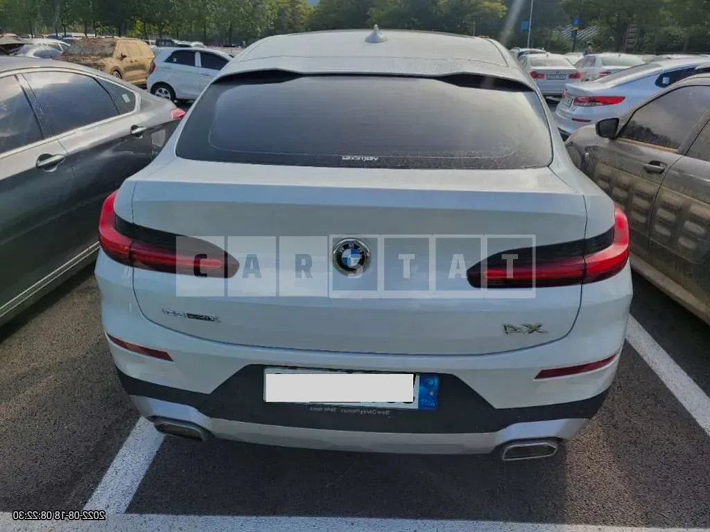 Photo 2 of 9: 2022 BMW X4 xDrive20i, VIN WBA21DT01N9J63314 — Korean insurance auction
