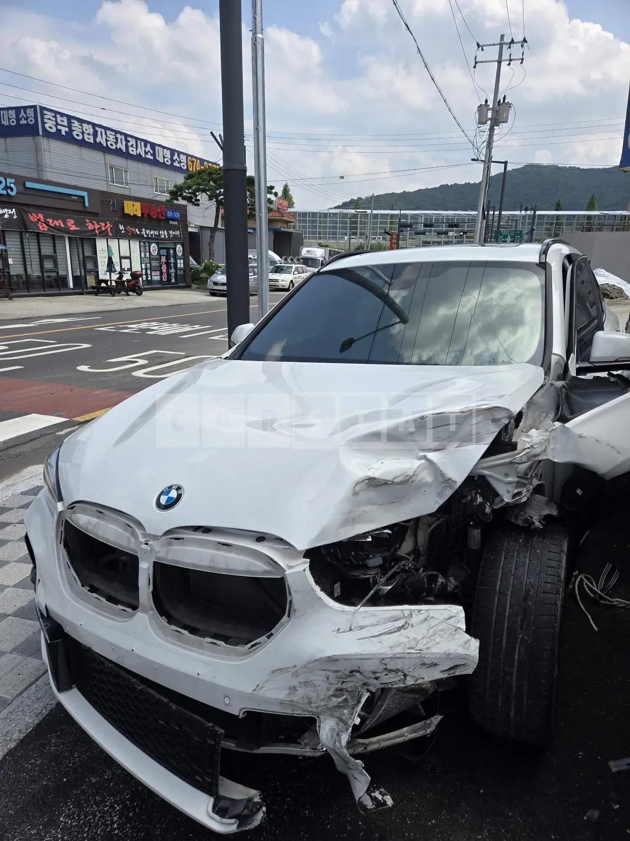 Photo 2 of 21: 2022 BMW X1 xDrive20i, VIN WBA11DG00N5U47420 — Korean insurance auction