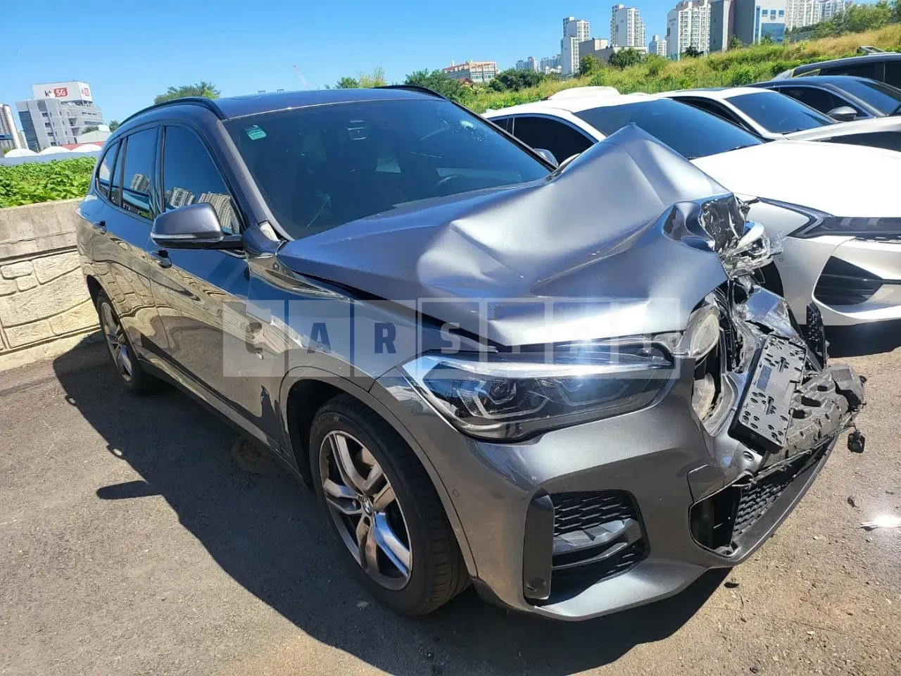 Photo 2 of 25: 2022 BMW X1 xDrive20i, VIN WBA11DG06N5U46952 — Korean insurance auction