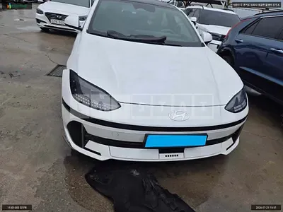 Photo 1 of 14: 2023 Hyundai IONIQ 6, VIN KMHM241CPPA027059 — Korean insurance auction