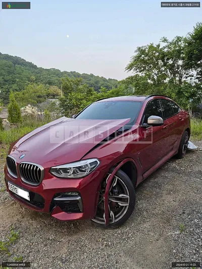 Photo 1 of 28: 2020 BMW X4 M40d, VIN WBAVJ7108L9B97669 — Korean insurance auction