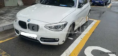 Photo 1 of 10: 2015 BMW 118d, VIN WBA1C1100FJ837122 — Korean insurance auction