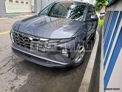 Photo 1 of 11: 2021 Hyundai Tucson, VIN KMHJB81BGMU011248 — Korean insurance auction