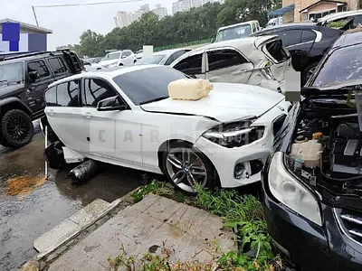 Photo 1 of 12: 2018 BMW 118d, VIN WBA1S5109J5K36237 — Korean insurance auction