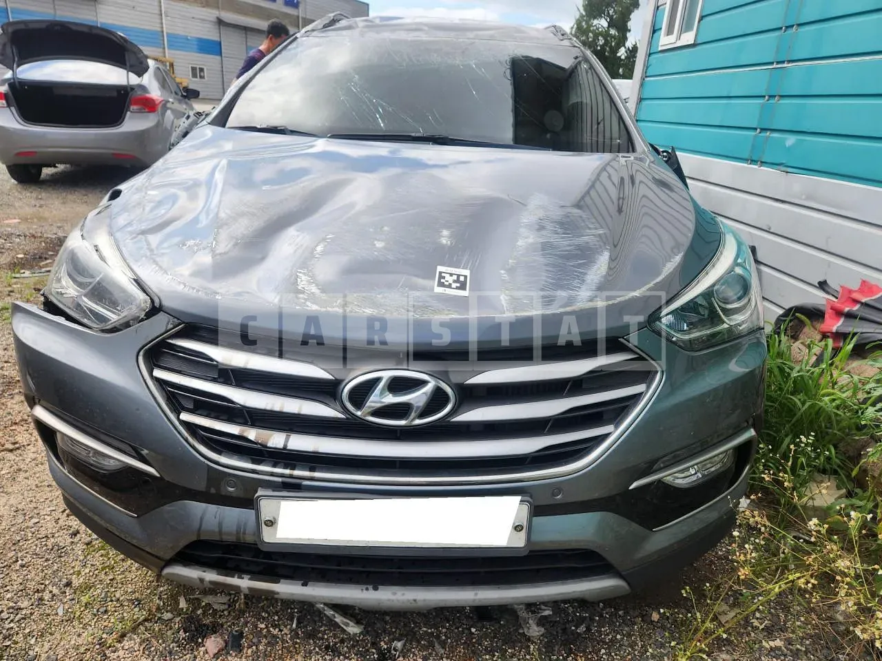 Photo 2 of 22: 2017 Hyundai Santa Fe, VIN KMHSW81UBJU847494 — Korean insurance auction