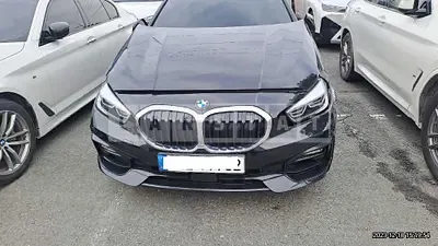 Photo 1 of 13: 2021 BMW 120i, VIN WBA7L7105M7J24692 — Korean insurance auction