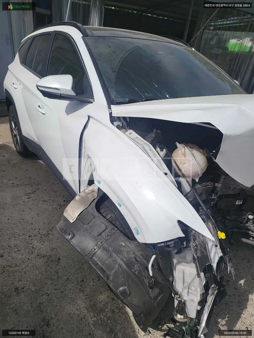 Photo 2 of 14: 2021 Hyundai Tucson, VIN KMHJC81BGMU011310 — Korean insurance auction