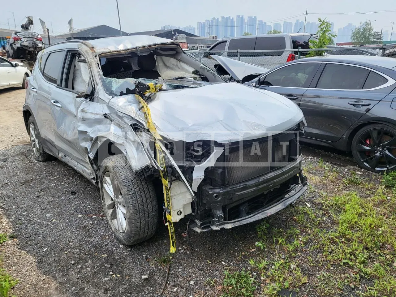 Photo 2 of 8: 2016 Hyundai Santa Fe, VIN KMHSW81XDGU635372 — Korean insurance auction