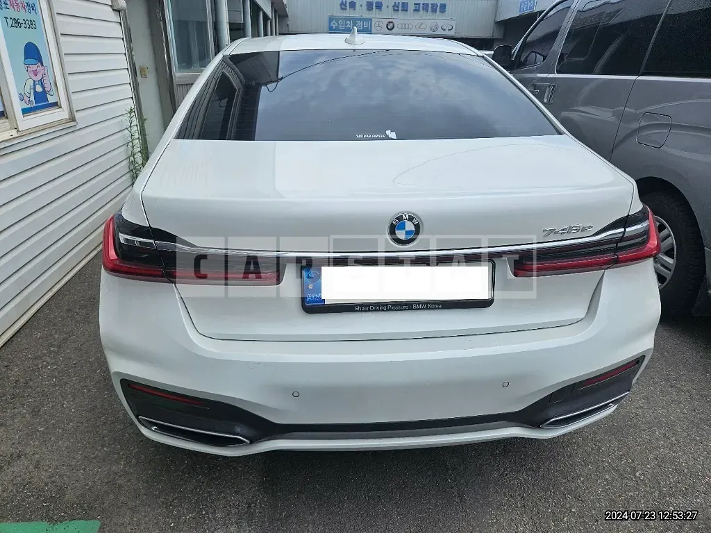 Photo 2 of 48: 2021 BMW 745e iPerformance, VIN WBA7D6106NCF62557 — Korean insurance auction