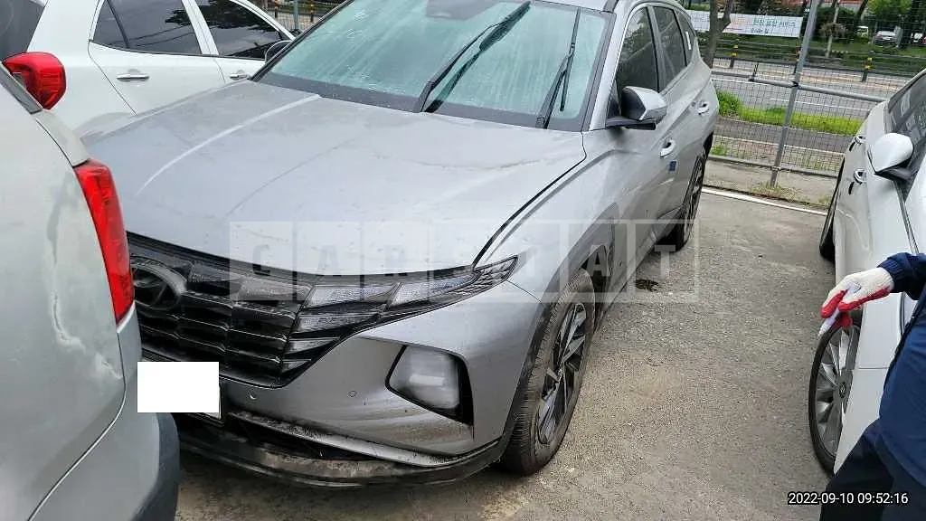 Photo 2 of 7: 2021 Hyundai Tucson, VIN KMHJC81CBMU054190 — Korean insurance auction