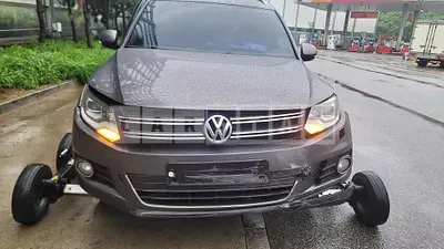Photo 1 of 9: 2015 Volkswagen Tiguan, VIN WVGZZZ5NZFW566595 — Korean insurance auction