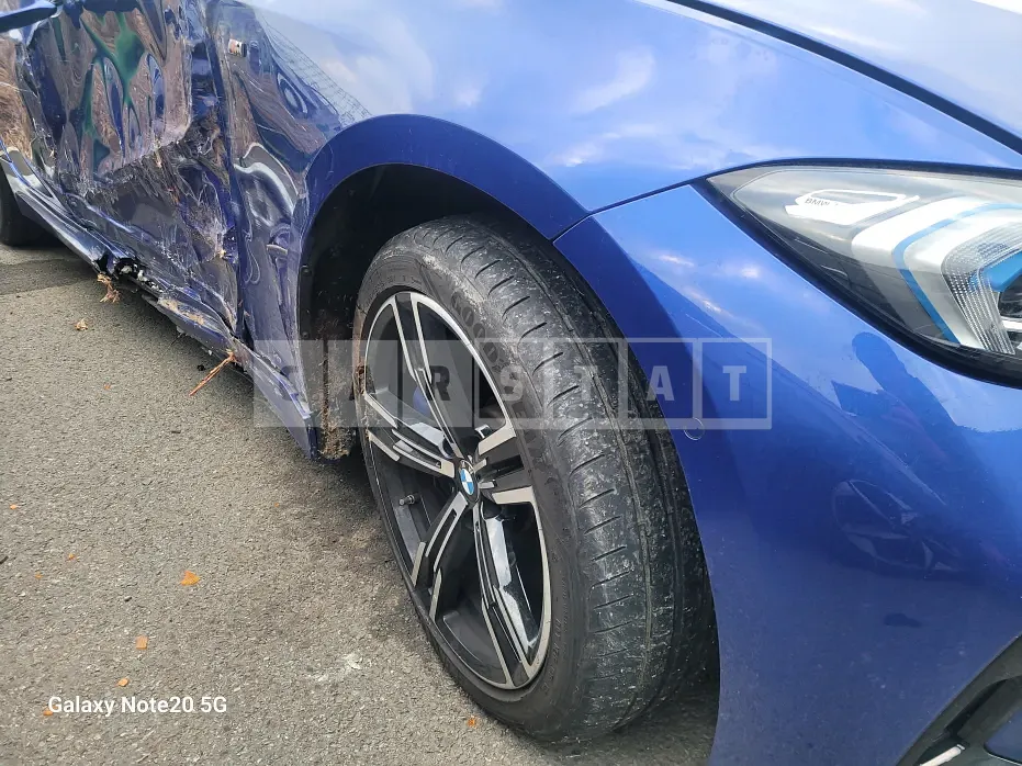 Photo 2 of 34: 2023 BMW 320i, VIN WBA61FS02PFP18368 — Korean insurance auction