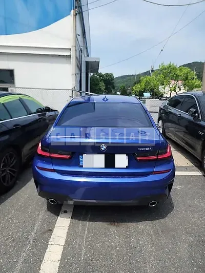 Photo 1 of 56: 2022 BMW 320i, VIN WBA5X5102NFM31390 — Korean insurance auction