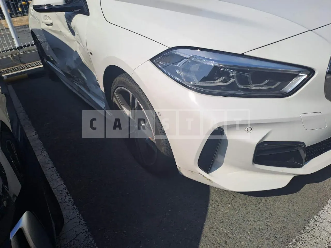 Photo 2 of 25: 2022 BMW 120i, VIN WBA7L7101N7L12496 — Korean insurance auction