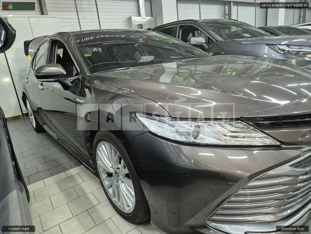 Photo 2 of 9: 2020 Toyota Camry Hybrid, VIN JTNB21HK2L3073237 — Korean insurance auction