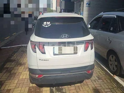 Photo 1 of 13: 2021 Hyundai Tucson, VIN KMHJC81CBMU013359 — Korean insurance auction
