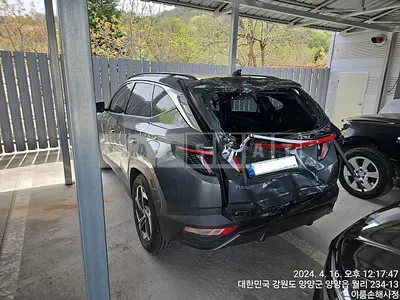 Photo 1 of 8: 2021 Hyundai Tucson, VIN KMHJE81CBMU001107 — Korean insurance auction