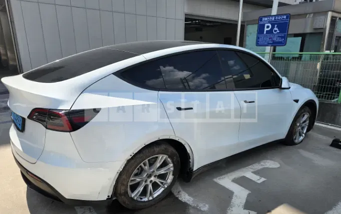 Photo 2 of 6: 2021 Tesla Model Y Standard Range, VIN 5YJYGDED6MF177483 — Korean insurance auction
