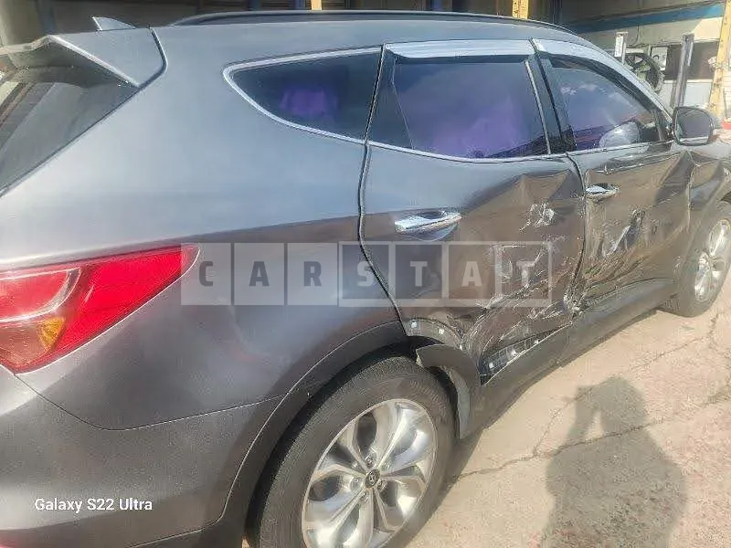 Photo 2 of 13: 2015 Hyundai Santa Fe, VIN KMHSW81UDFU491130 — Korean insurance auction