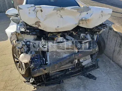 Photo 1 of 12: 2021 Hyundai Tucson, VIN KMHJC81CBMU008365 — Korean insurance auction