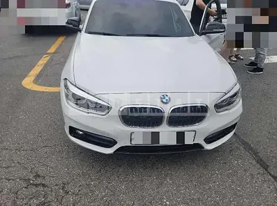 Photo 1 of 26: 2016 BMW 118d, VIN WBA1S5102H5D28755 — Korean insurance auction
