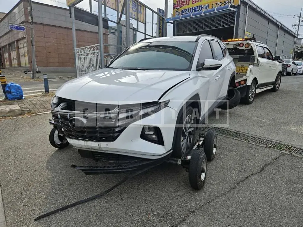 Photo 2 of 26: 2021 Hyundai Tucson, VIN KMHJC81BGMU063630 — Korean insurance auction
