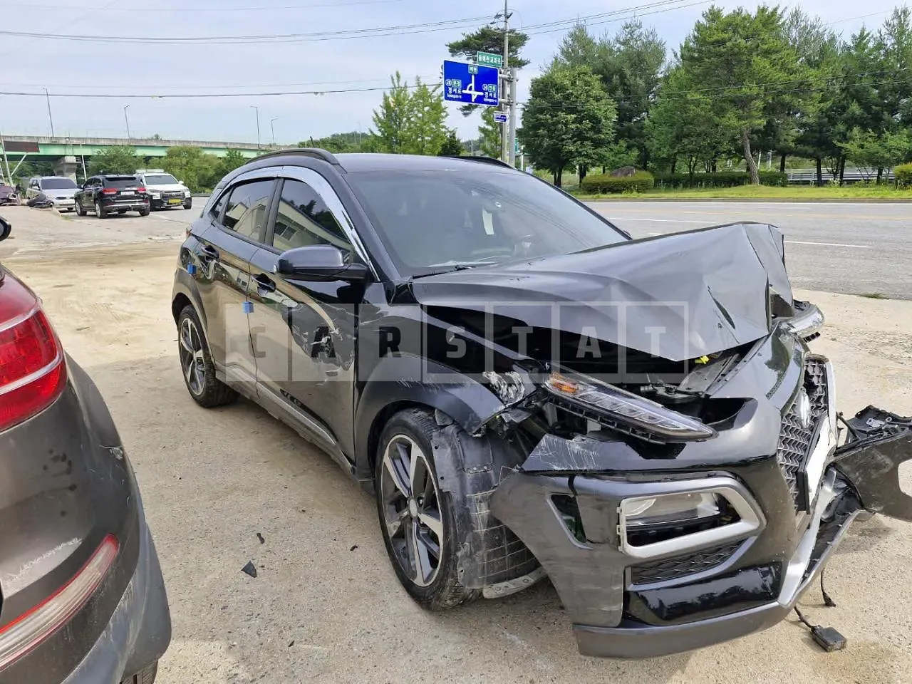 Photo 2 of 26: 2018 Hyundai Kona, VIN KMHK5816GJU139858 — Korean insurance auction