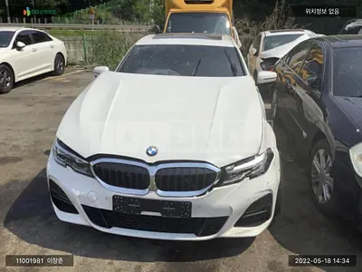 Photo 1 of 15: 2021 BMW 320i, VIN WBA5X5101MFL60472 — Korean insurance auction