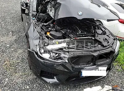 Photo 1 of 25: 2018 BMW M5, VIN WBSJF0108JG966924 — Korean insurance auction