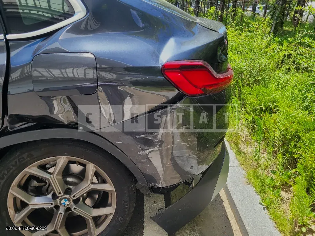 Photo 2 of 9: 2022 BMW X4 xDrive20i, VIN WBA21DT04N9N34353 — Korean insurance auction