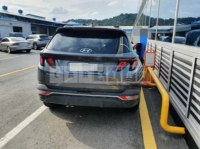 Photo 1 of 25: 2021 Hyundai Tucson, VIN KMHJC81BGMU009847 — Korean insurance auction