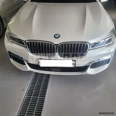 Photo 1 of 11: 2018 BMW 740Li xDrive, VIN WBA7E4102JGV27324 — Korean insurance auction